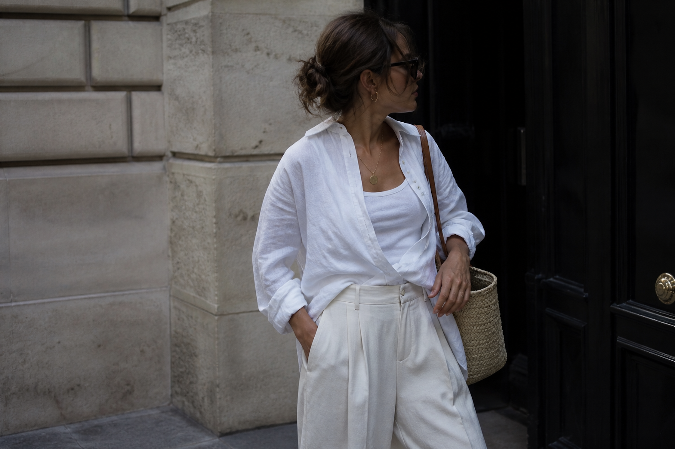 Wide-leg linen trousers with white tank top